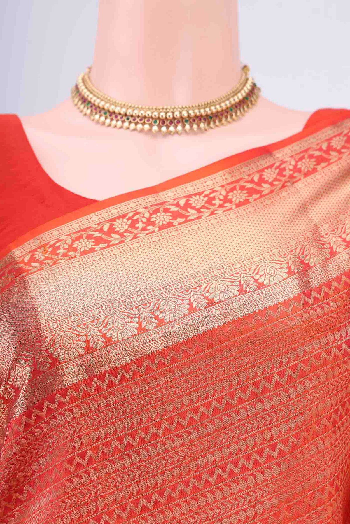 Border image of Brick Orange Dual Tone Soft Silk Saree with Zari Brocade on the body and Zari Border. 