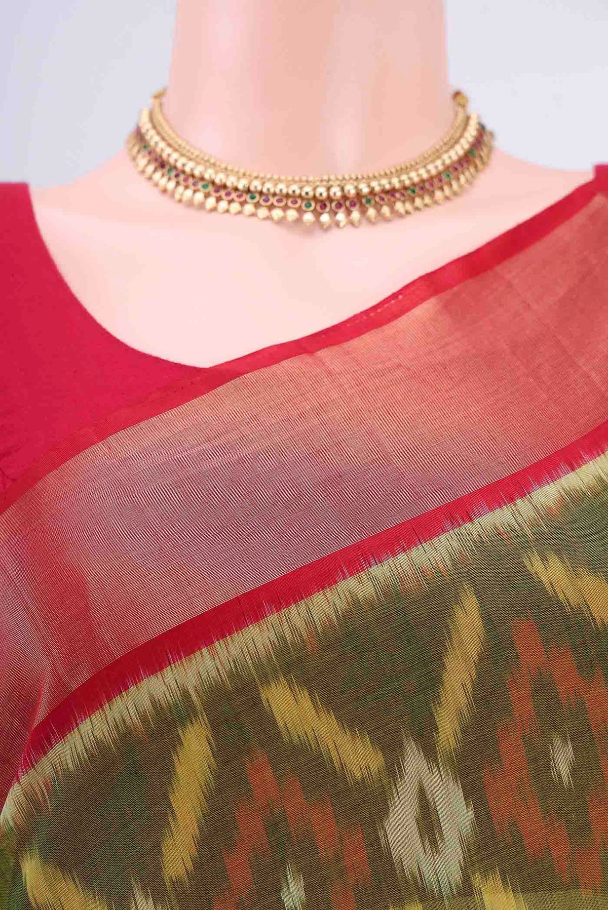 Border image of Mehandi Green Kora Cotton Saree with Ikat design on the body and Zari Border