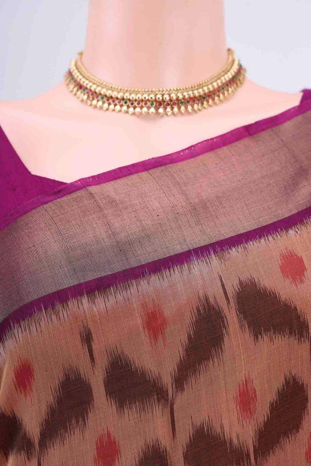 Border image of Dark Beige Kota Cotton Saree with Ikat design on the body and Zari Border