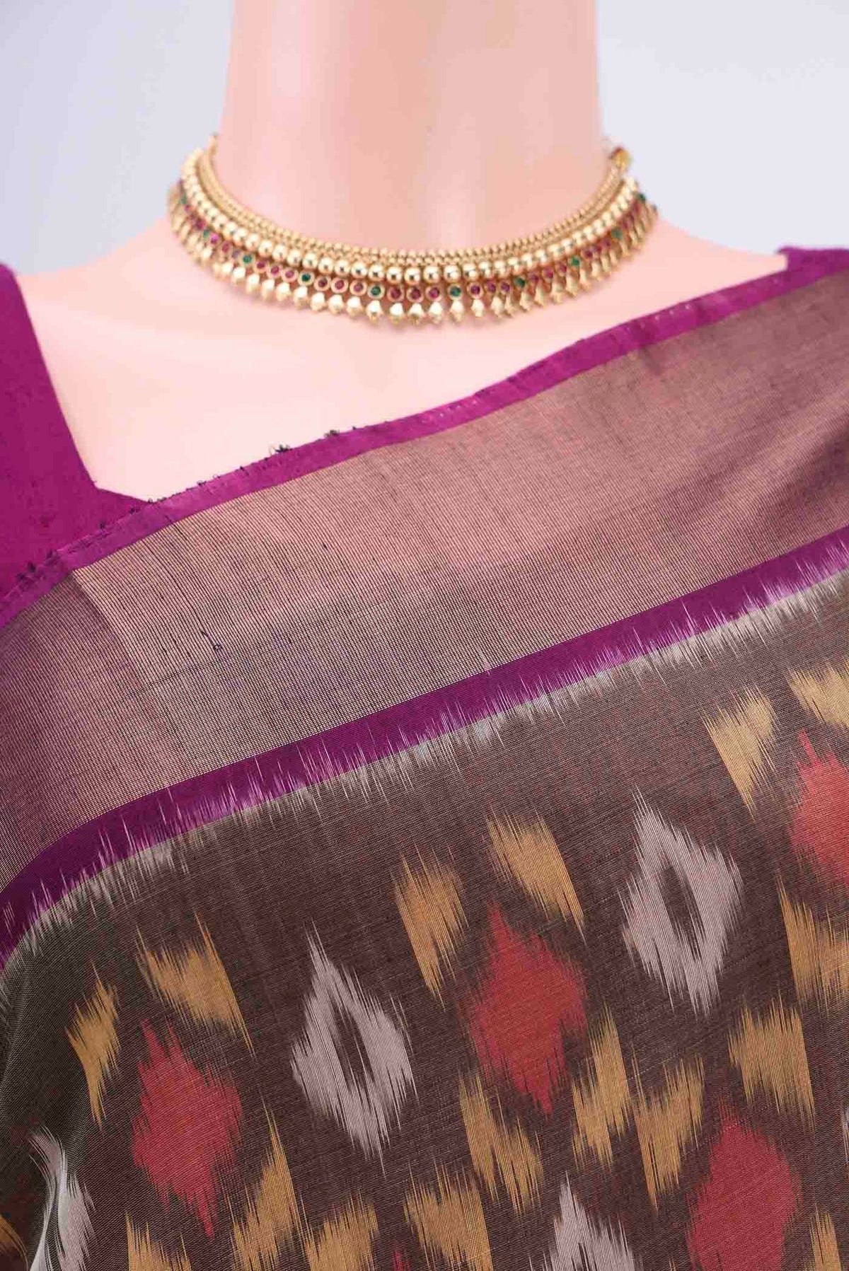 Border image of Davys Grey Kora Cotton Saree with Ikat design on the body and Zari Border