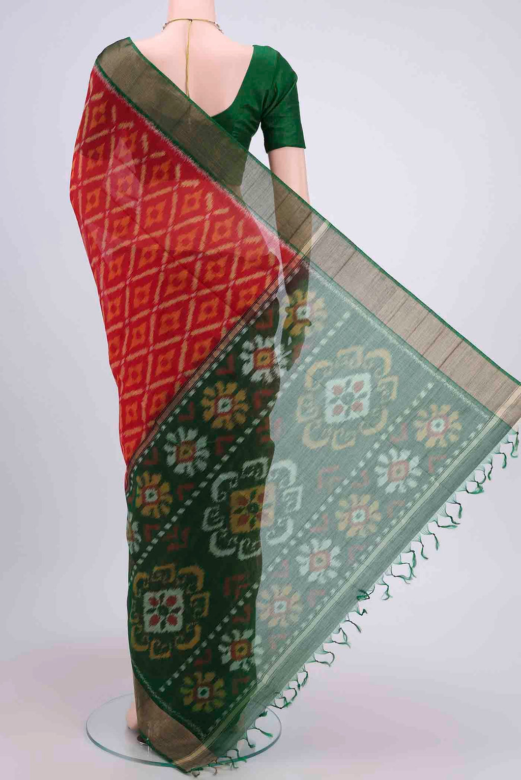 Flat view of Red Kora Cotton Saree with Ikat design on the body and Zari Border