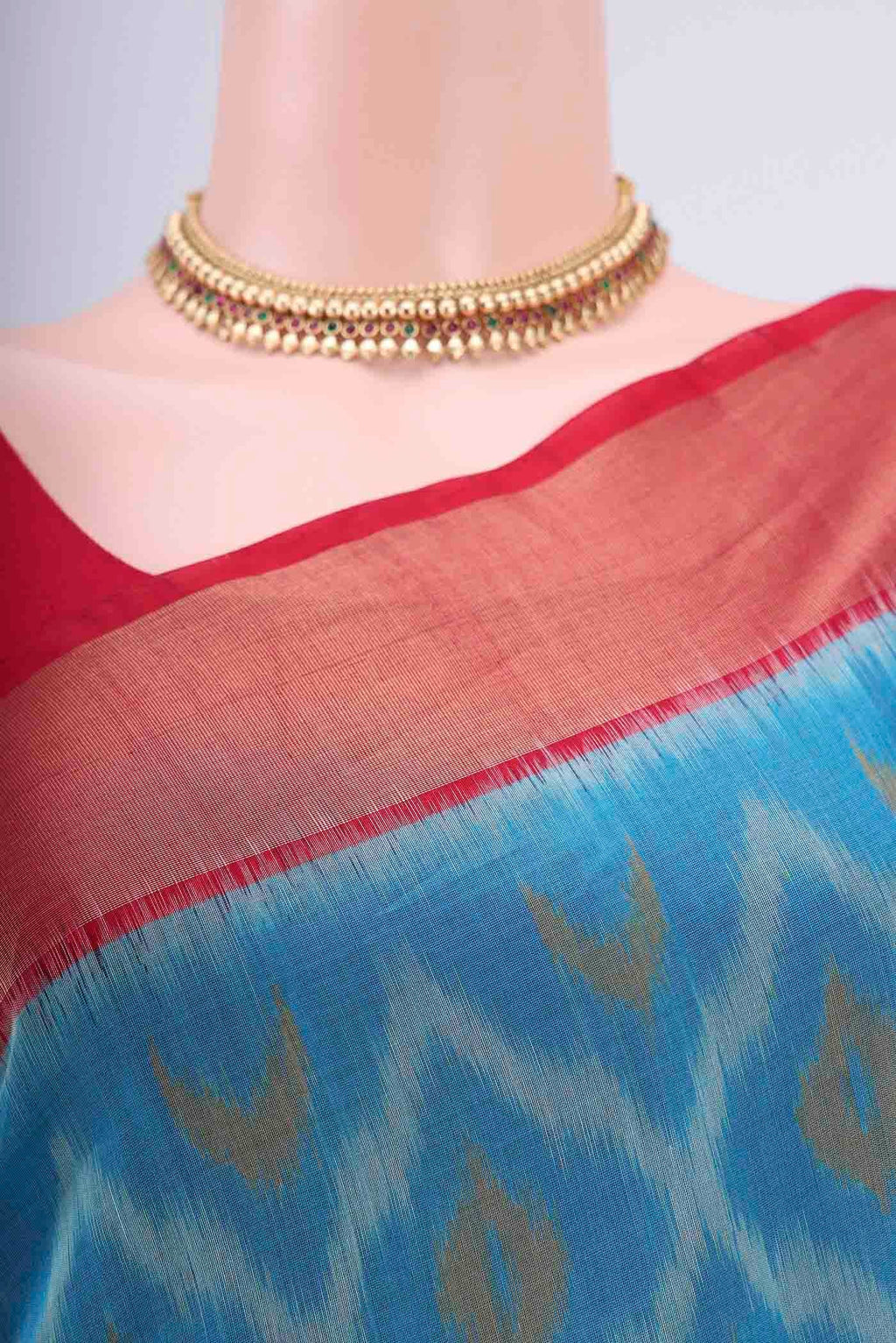 Border image of Blue Kora Cotton Saree with Ikat design on the body and Zari Border