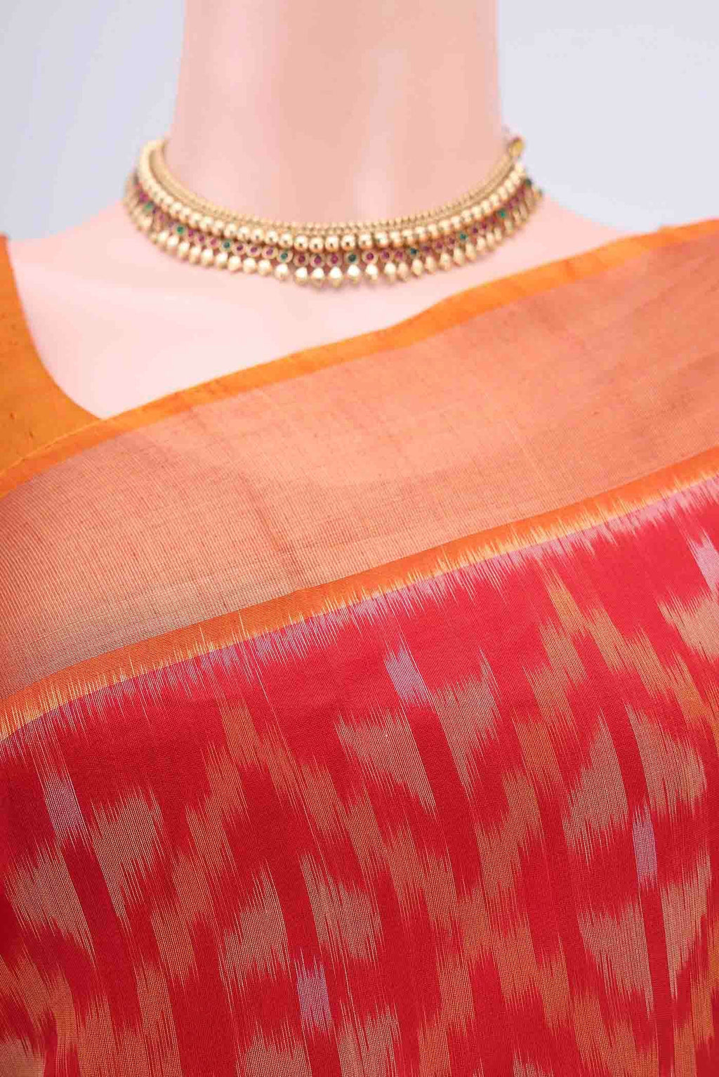 Border image of Red Pochampally Saree with Ikat design on the body and Zari Border