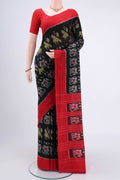 Black Pochampally Cotton Saree with Ikat design on the body and Ikat Border.  displayed on a mannequin