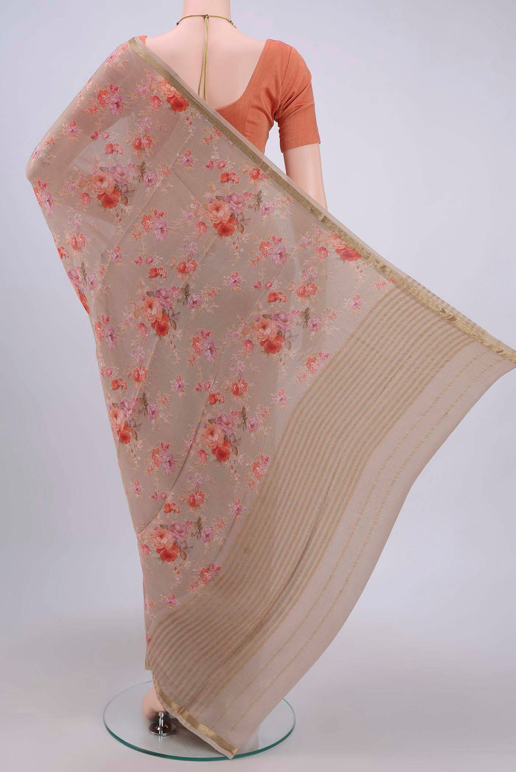 Flat view of Dark Beige Crepe Saree with Floral Print on the body and Zari Border. 