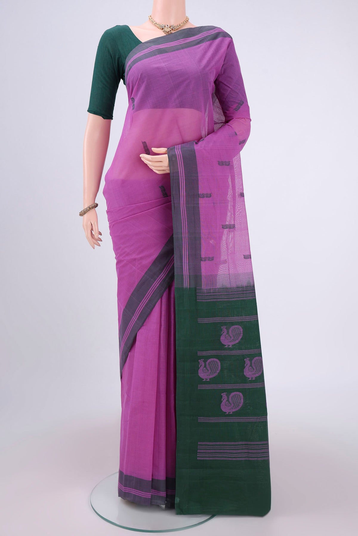 Lavender Kanchi Cotton Saree with Thread Butta on the body and Thread Border.  displayed on a mannequin