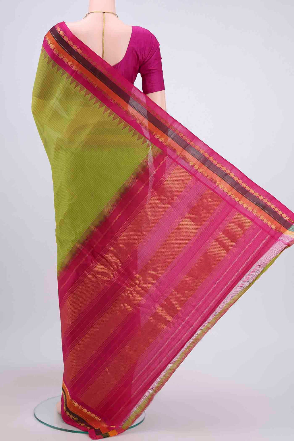Flat view of Light Green Gadwal Silk Saree with Stripes on the body and Zari Border