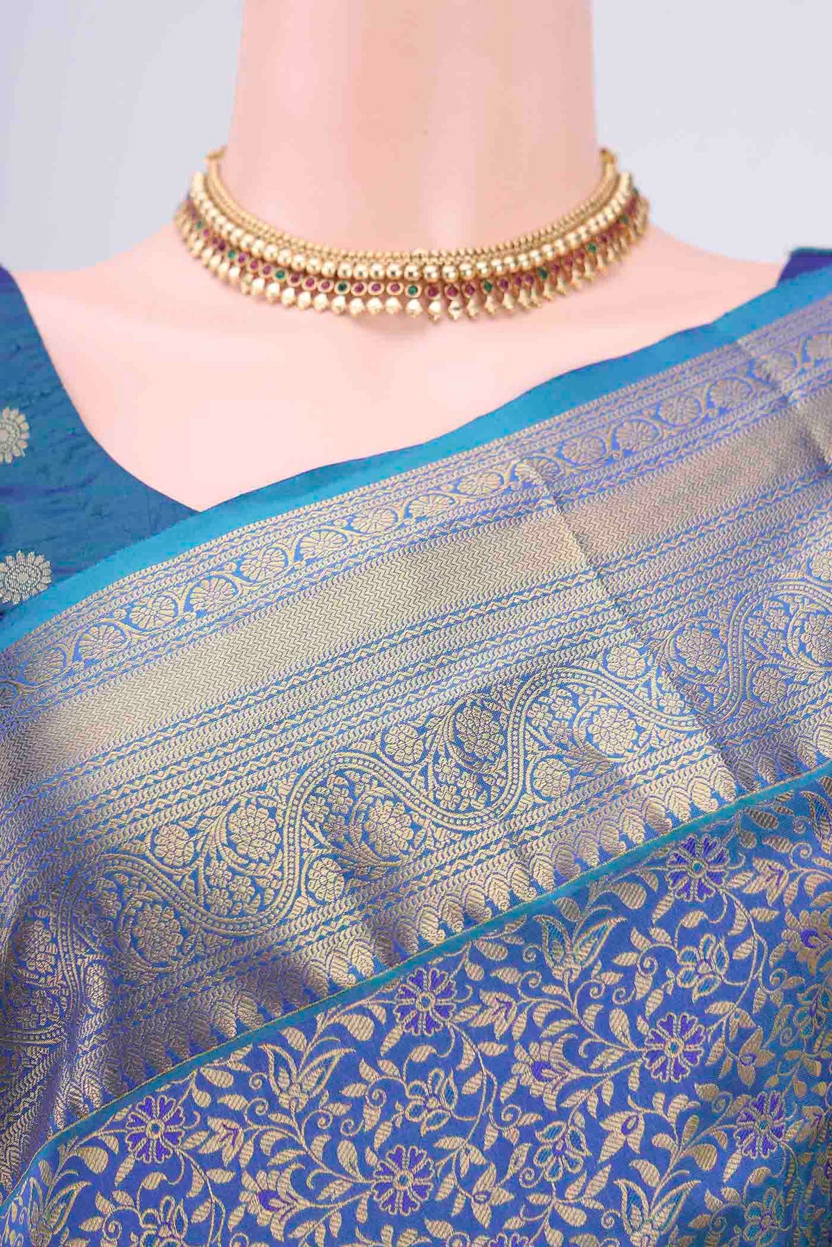 Border image of Peacock Blue Bangalore Silk Saree with Zari Brocade on the body and Zari Border. 