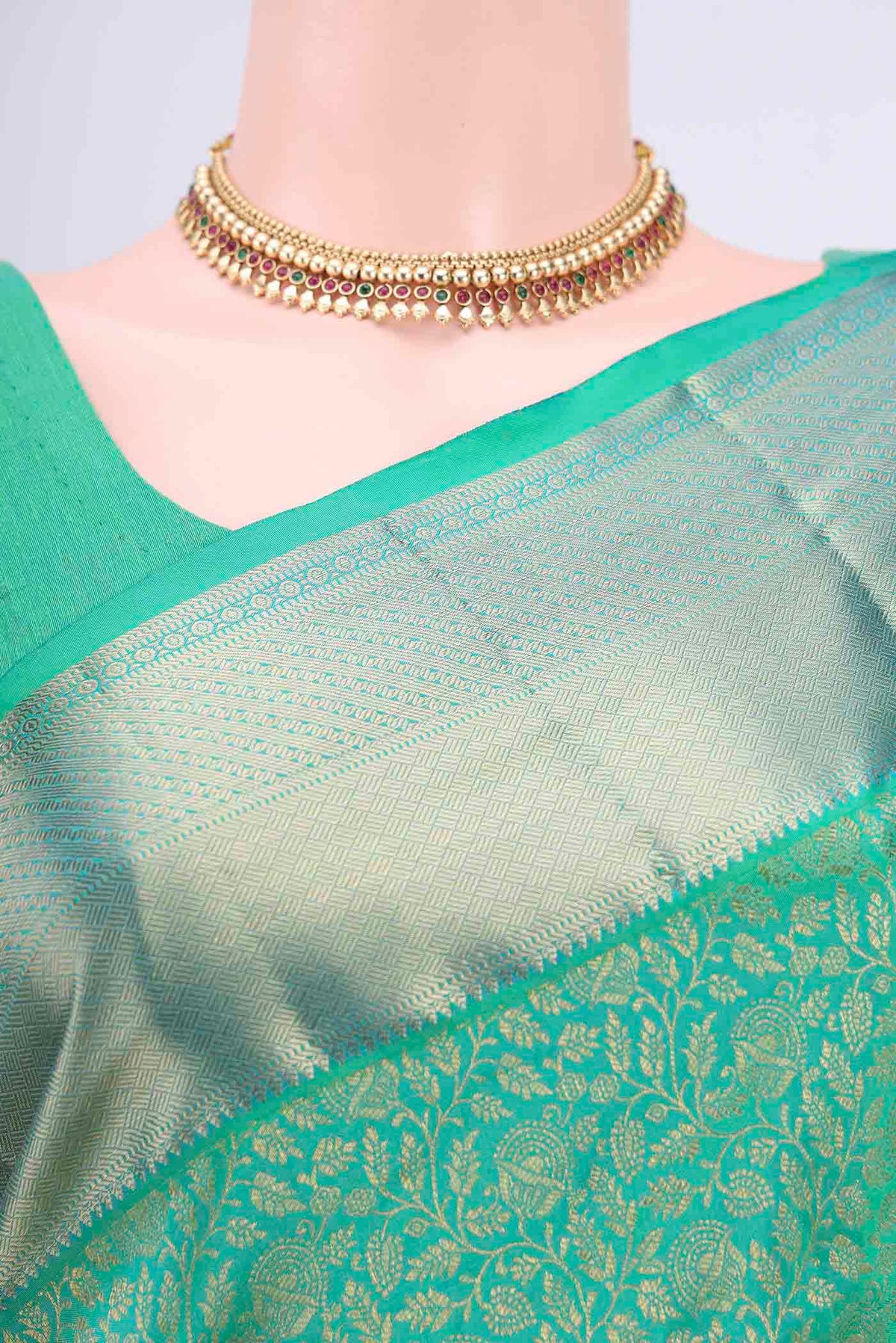 Border image of Sea Green Kanchipuram Saree with Zari Brocade on the body and Rising Temple Border. 
