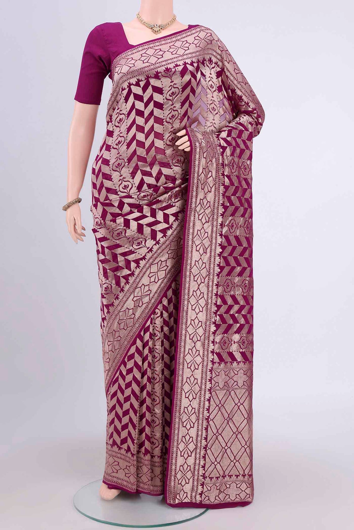 Purple Banarasi Georgette Saree with Zari Brocade on the body and Zari Border.  displayed on a mannequin