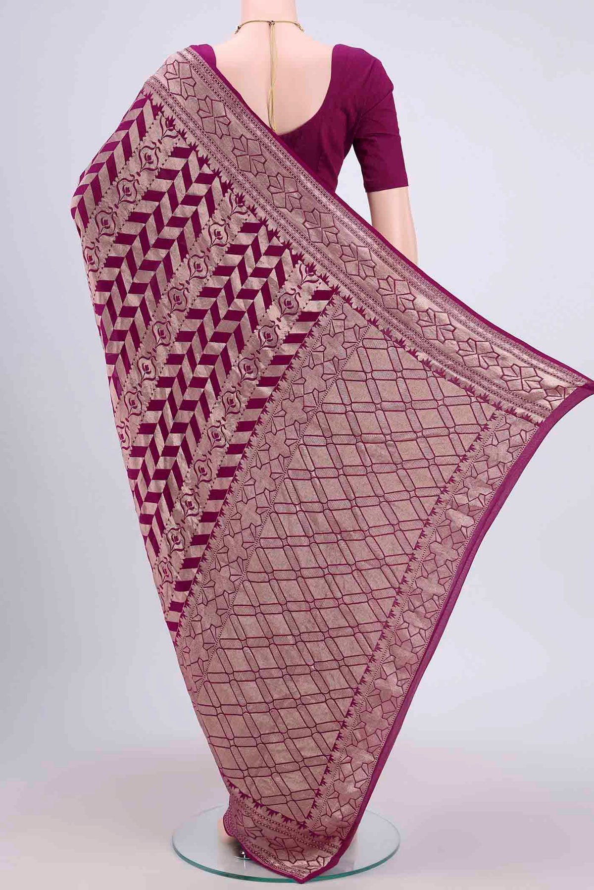 Flat view of Purple Banarasi Georgette Saree with Zari Brocade on the body and Zari Border. 