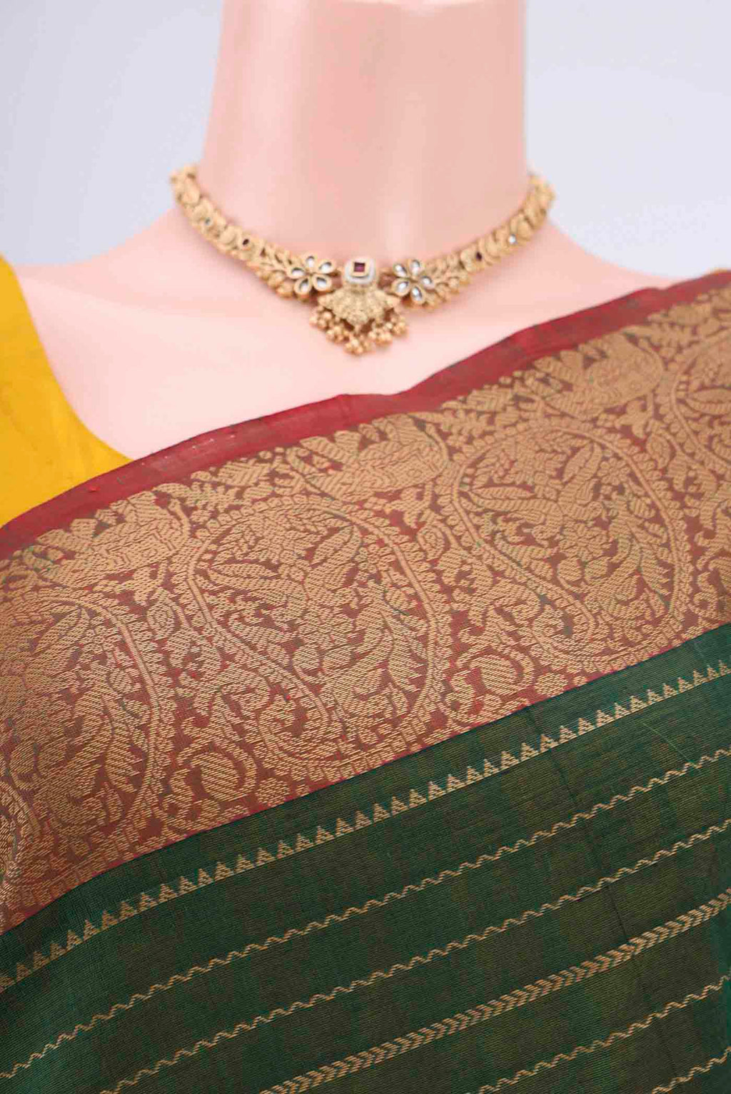 Border image of Bottle Green Coimbatore Cotton Saree with Stripes on the body and Plain Border. 
