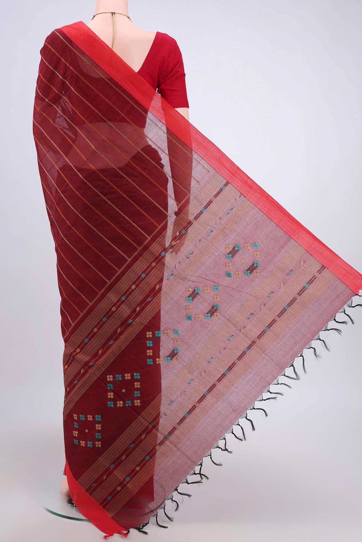 Flat view of Maroon Coimbatore Cotton Saree with Stripes on the body and Plain Border. 
