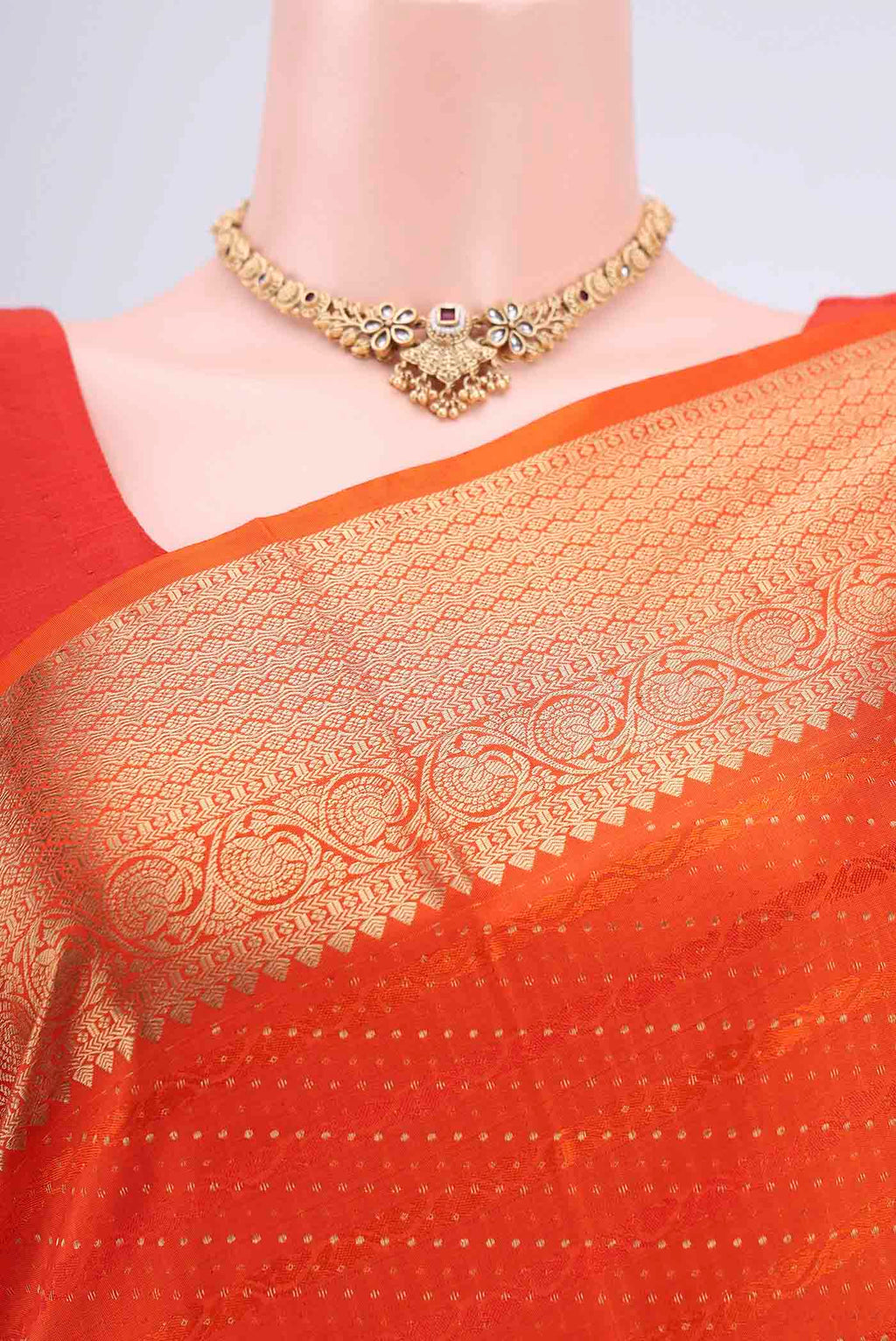Border image of Orange Soft Silk Saree with Jacquard With Zari Butta on the body and Zari Border. 