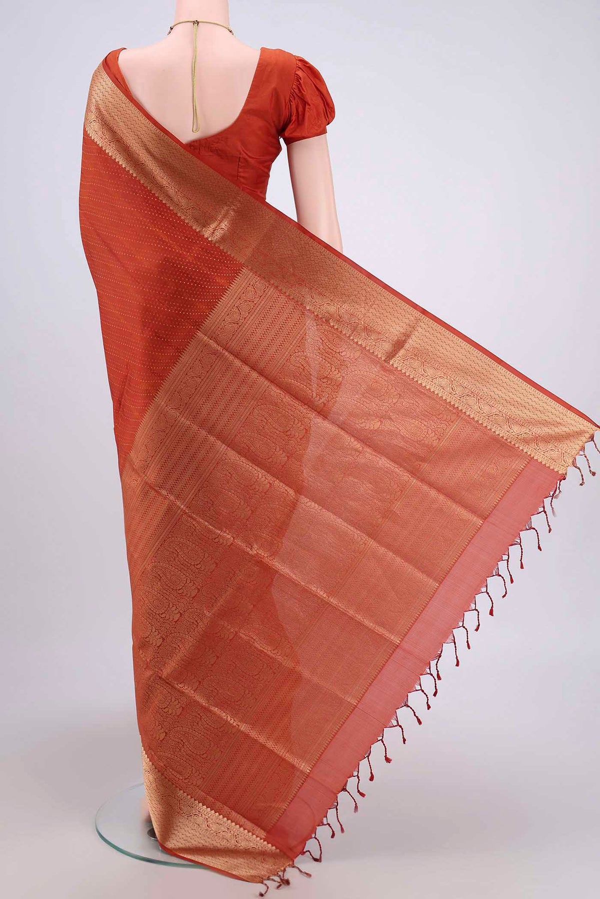 Flat view of Mustard Soft Silk Saree with Jacquard With Zari Butta on the body and Zari Border. 