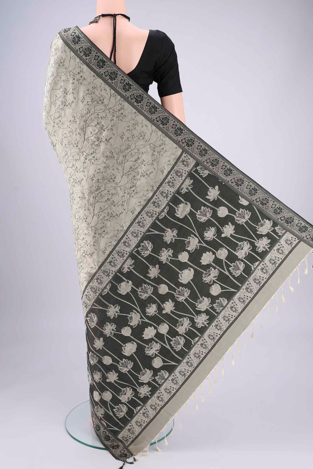 Flat view of Davys Grey Soft Silk Saree with Jacquard design on the body and Thread Border. 