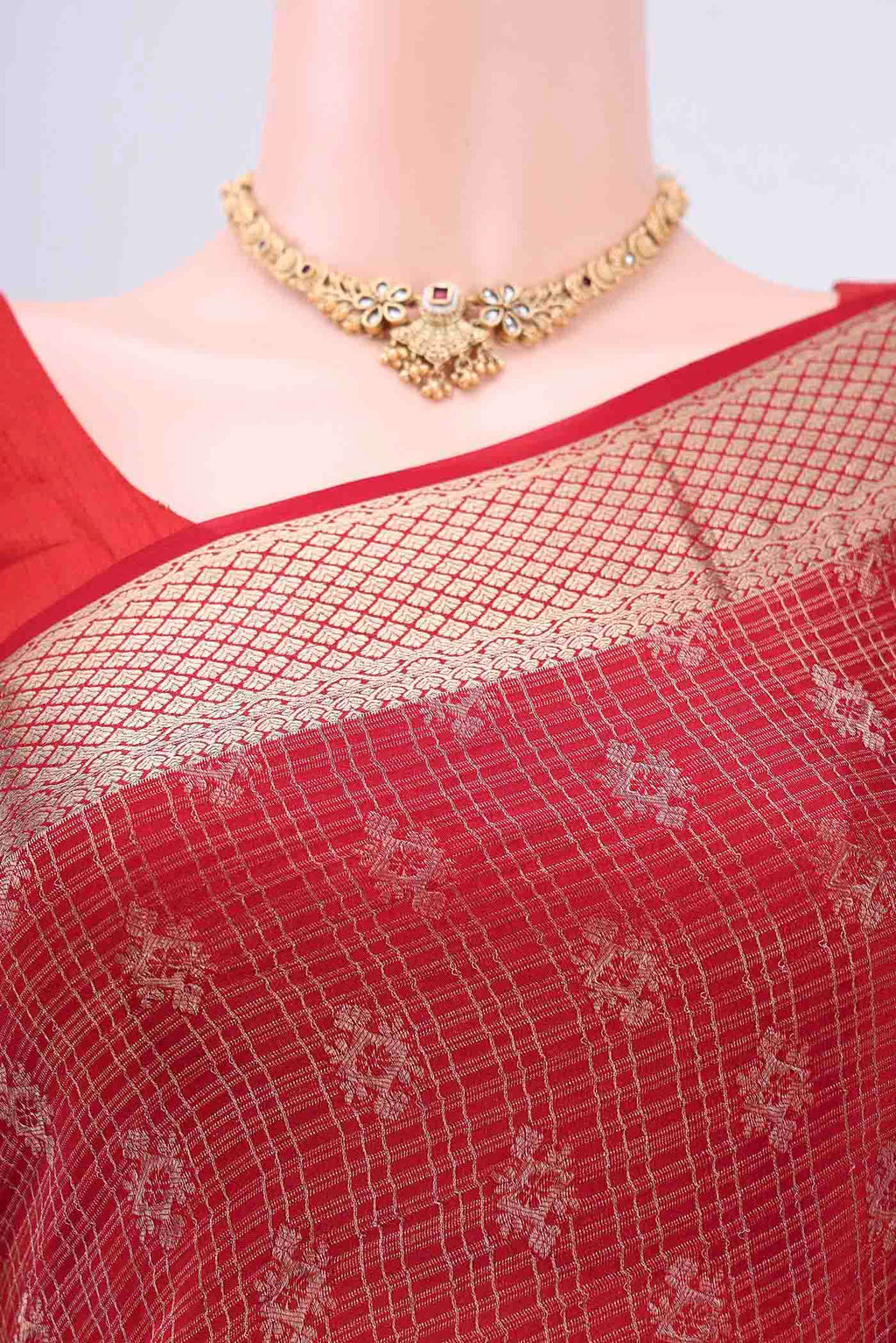 Border image of Red Mysore Crepe Saree with Zari Brocade on the body and Zari Border. 