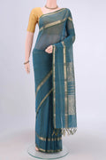 Green Kanchi Cotton Saree with Stripes on the body and Zari Border.  displayed on a mannequin