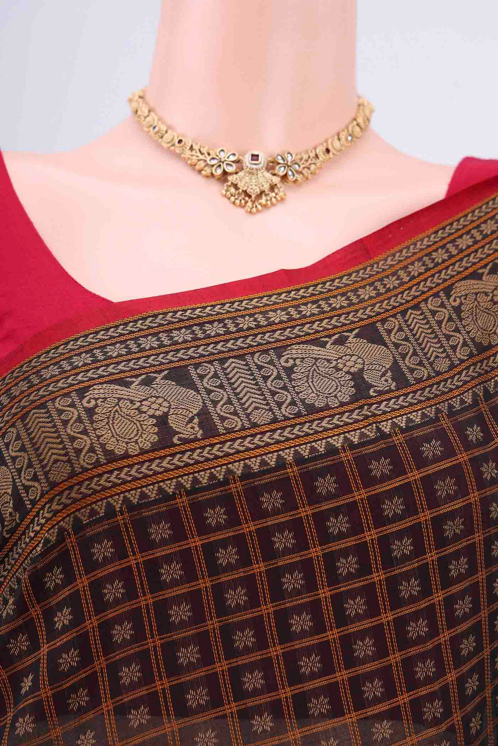 Border image of Black Kanchi Cotton Saree with Checked design on the body and Zari Border. 