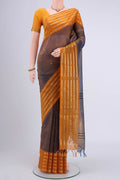 Brown Dual Tone Blended Coimbatore Silk Cotton Saree with Zari Butta on the body and Zari Border.  displayed on a mannequin