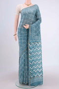 Maya Blue Maheshwari Silk Cotton Saree with Printed design on the body and Thin Zari Line.  displayed on a mannequin