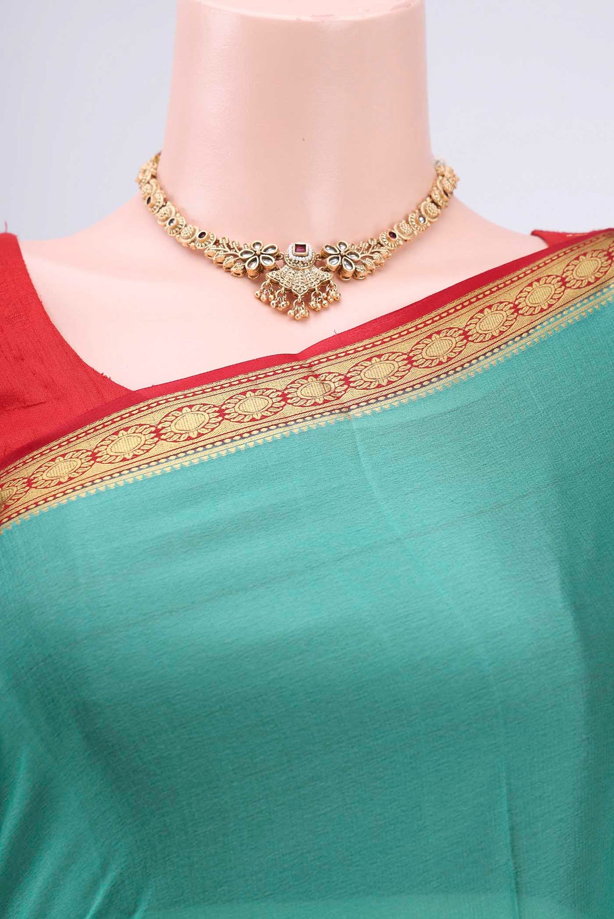 Border image of Sea Green Mysore Crepe Saree with Plain Body and Zari Border. 