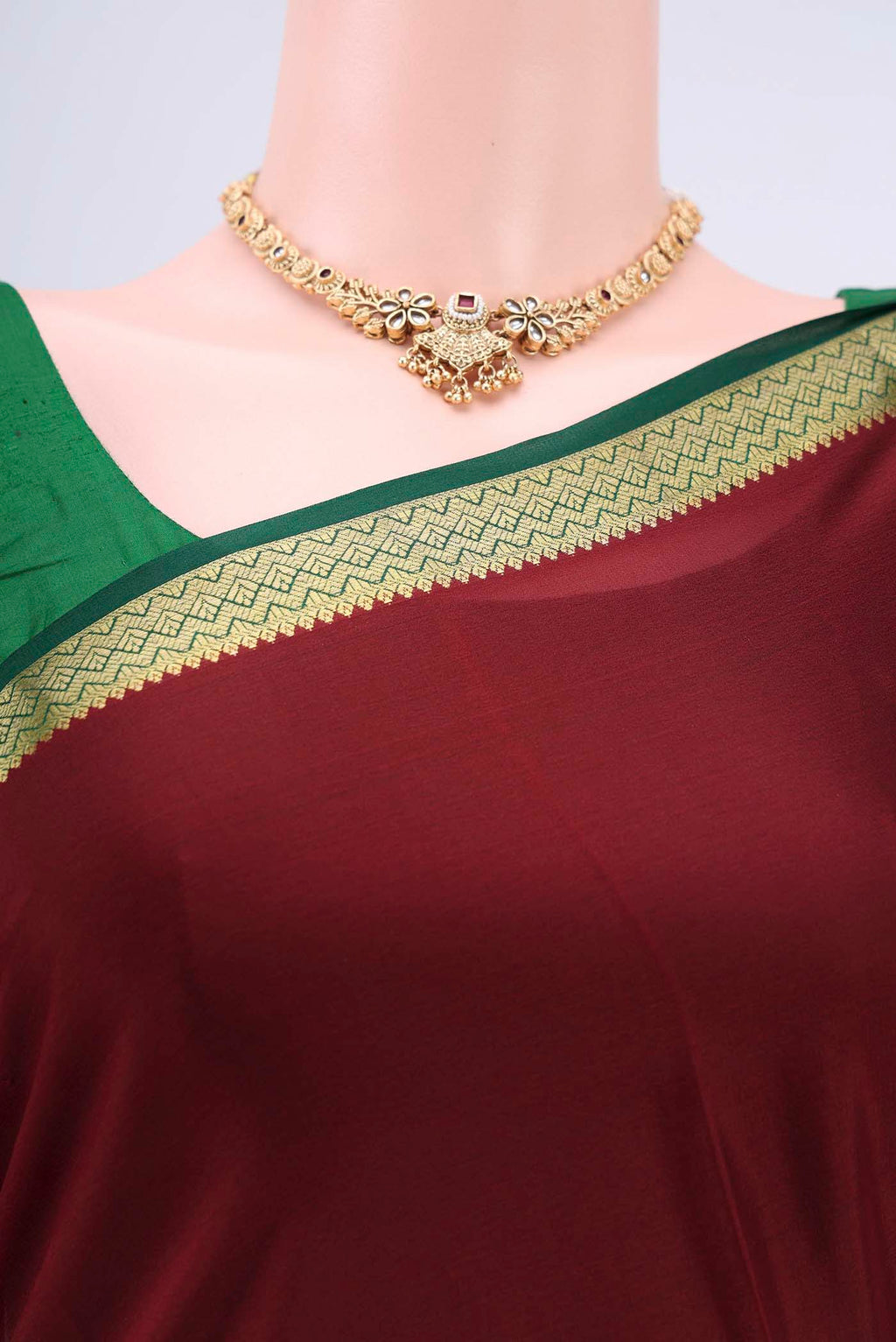 Border image of Maroon Mysore Crepe Saree with Plain Body and Zari Border. 