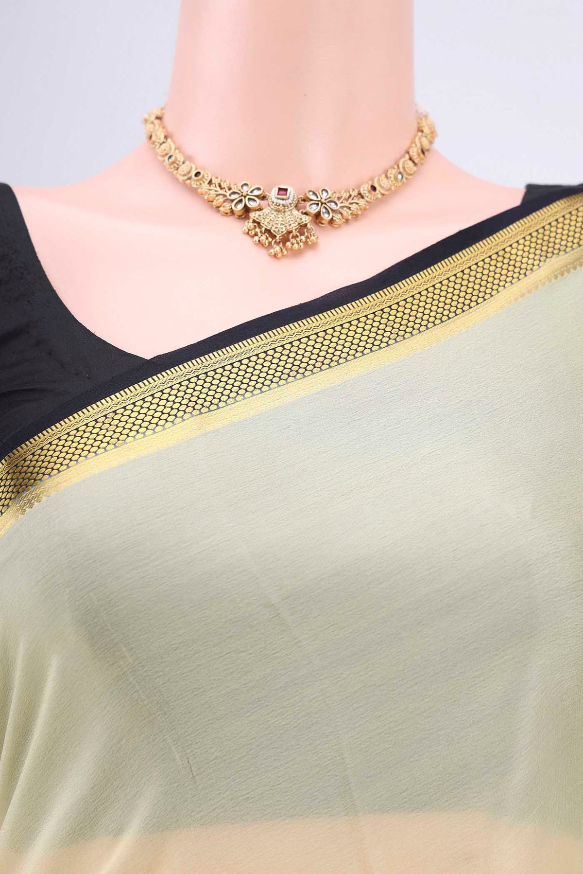 Border image of Cream Mysore Crepe Saree with Plain Body and Zari Border. 
