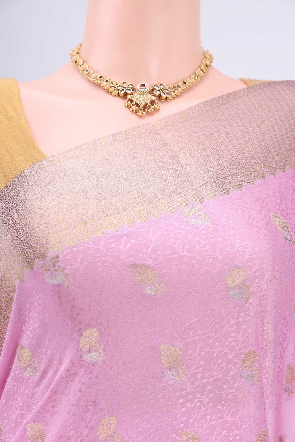 Border image of Rose pink Mysore Crepe Saree with Zari Butta on the body and Zari Border. 