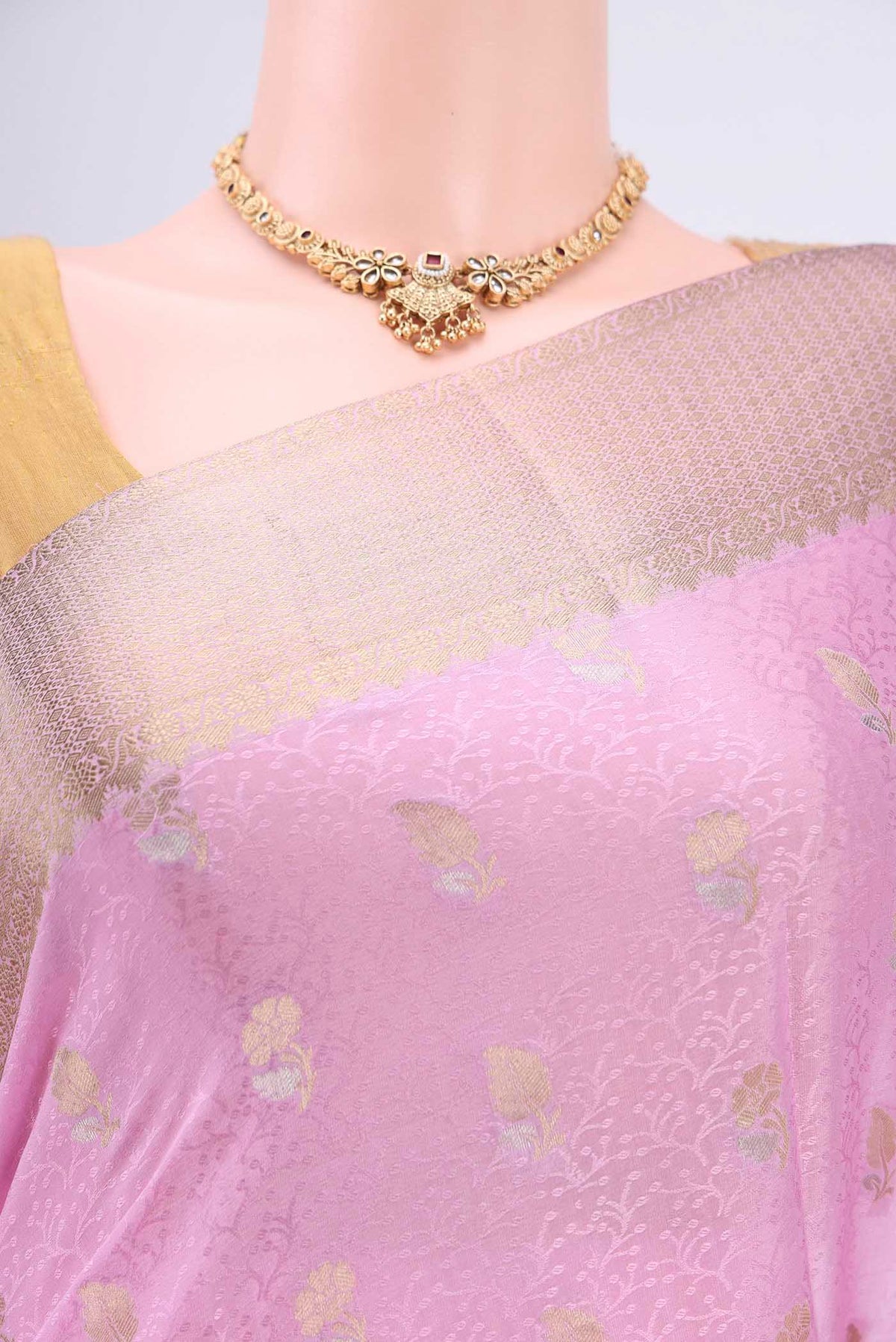 Border image of Rose pink Mysore Crepe Saree with Zari Butta on the body and Zari Border. 