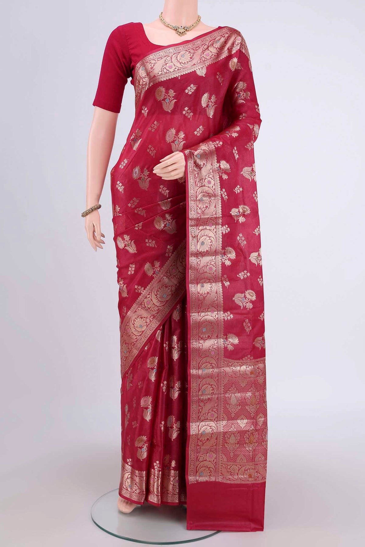 Dark Pink Banarasi Tussar Silk Saree with Zari And Thread Butta on the body and Zari And Thread Border.  displayed on a mannequin