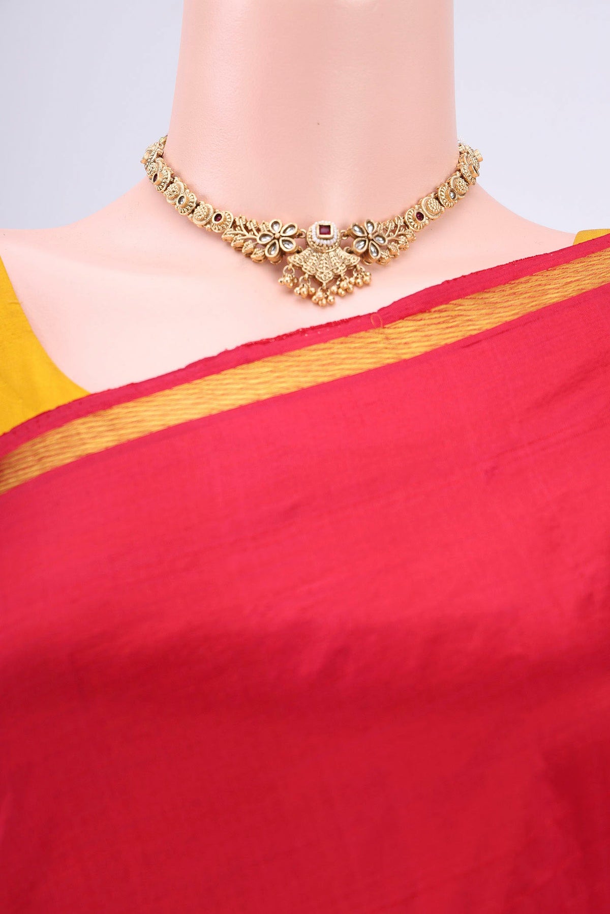 Border image of Red Kanchipuram Silk Saree with Plain Body and Zari Border. 