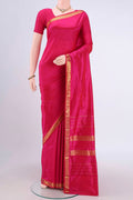 Dark Pink Kanchipuram Saree with Plain Body and Zari Border.  displayed on a mannequin