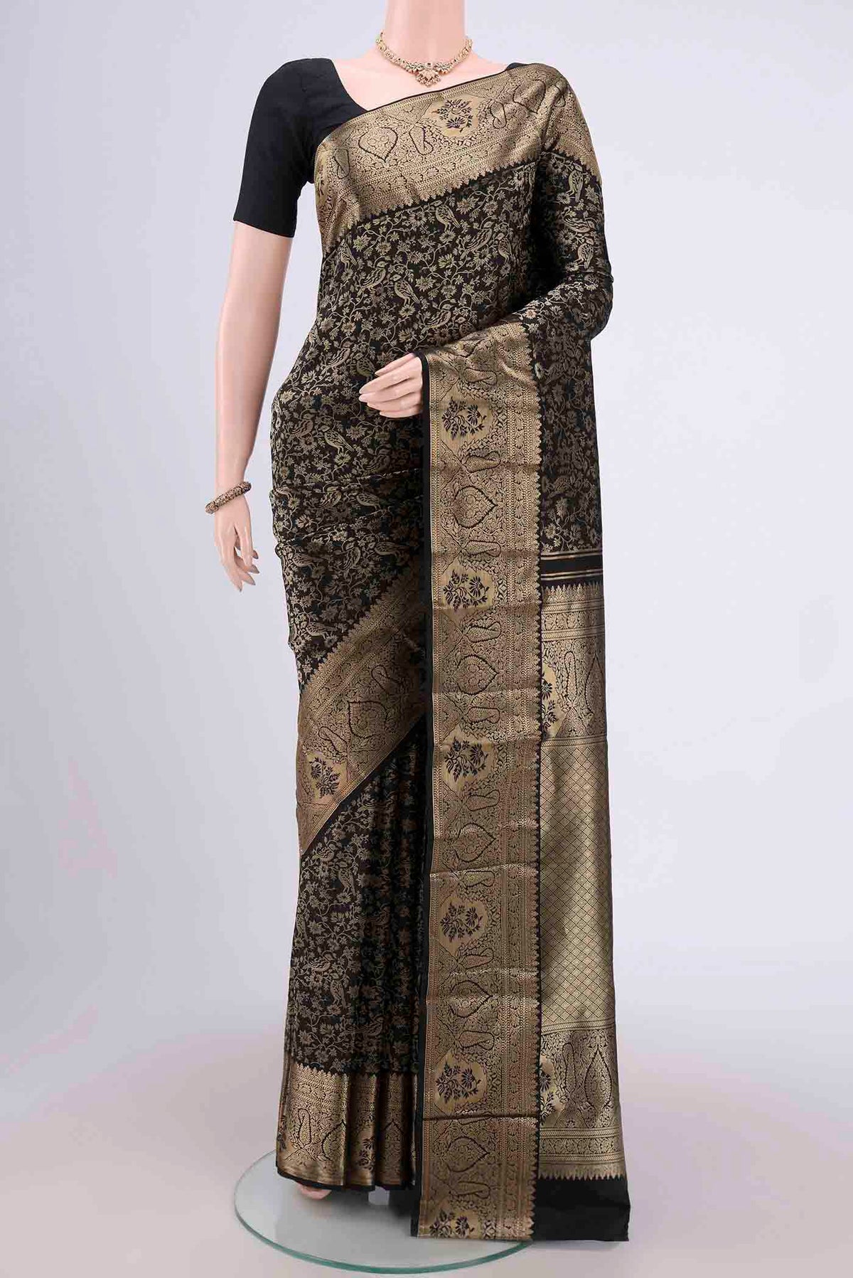 Black Bangalore Silk Saree with Zari Brocade on the body and Zari Border.  displayed on a mannequin