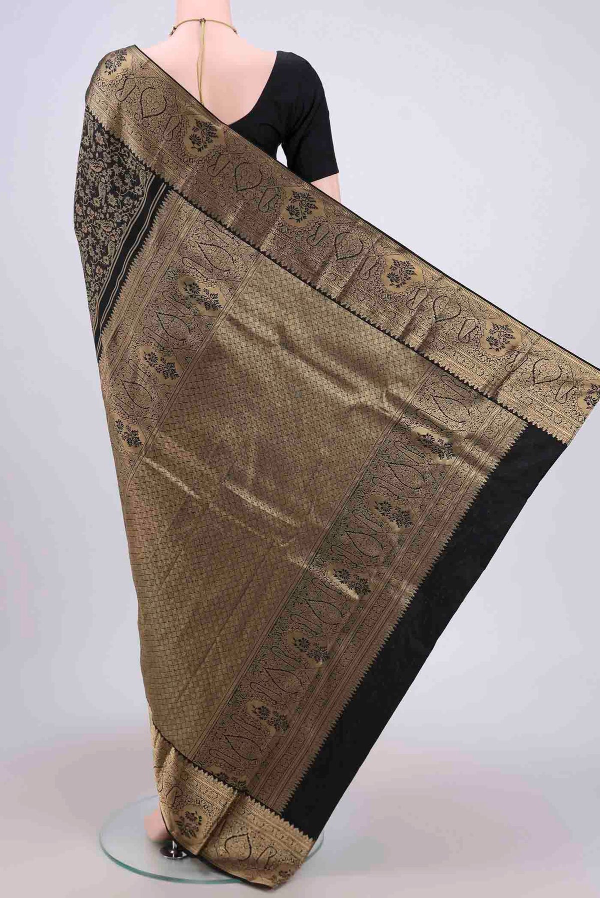 Flat view of Black Bangalore Silk Saree with Zari Brocade on the body and Zari Border. 