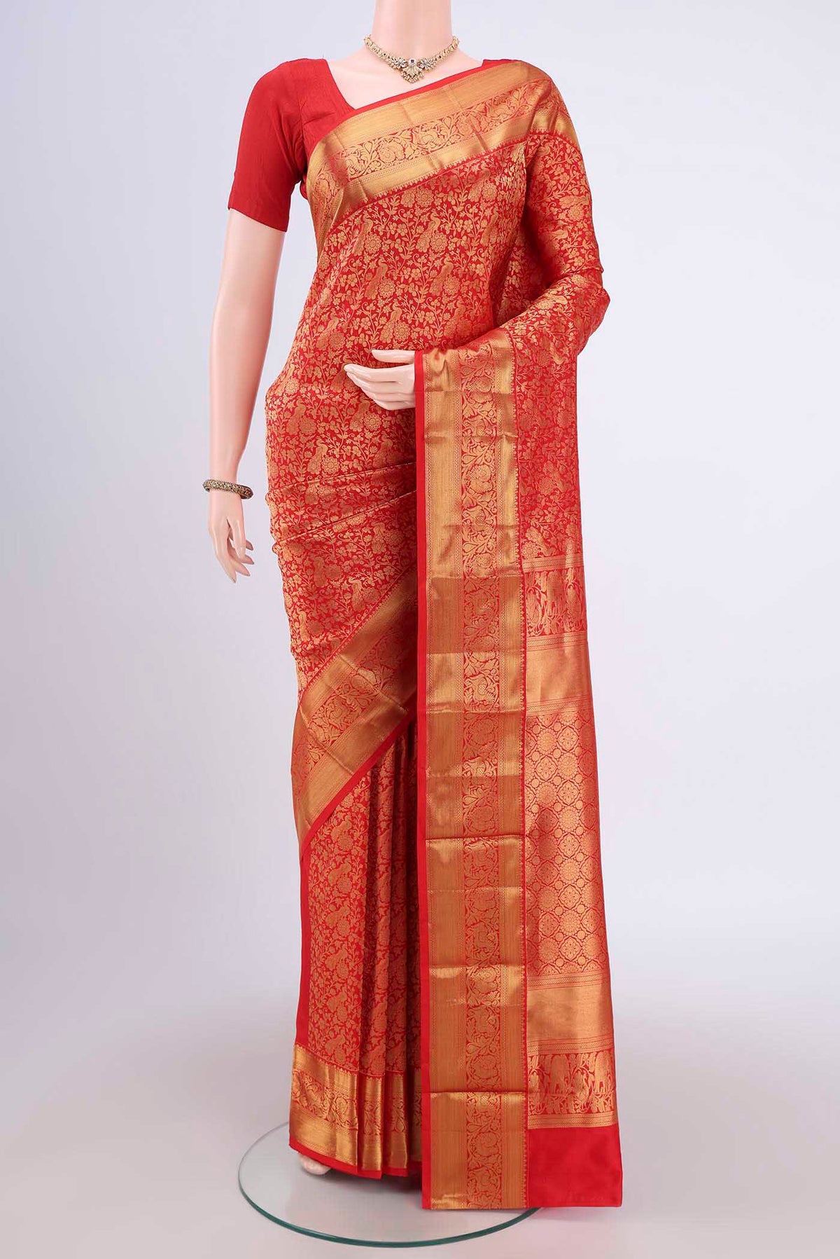 Red Bangalore Silk Saree with Zari Brocade on the body and Zari Border.  displayed on a mannequin