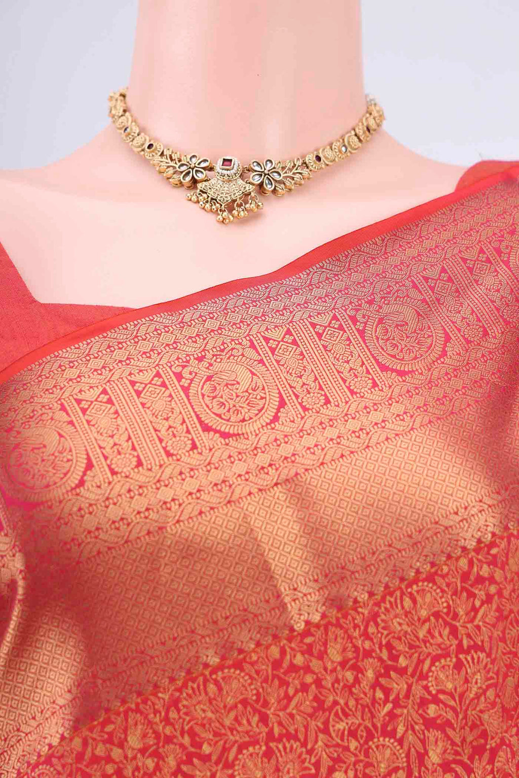 Border image of Rust Bangalore Silk Saree with Zari Brocade on the body and Zari Border. 