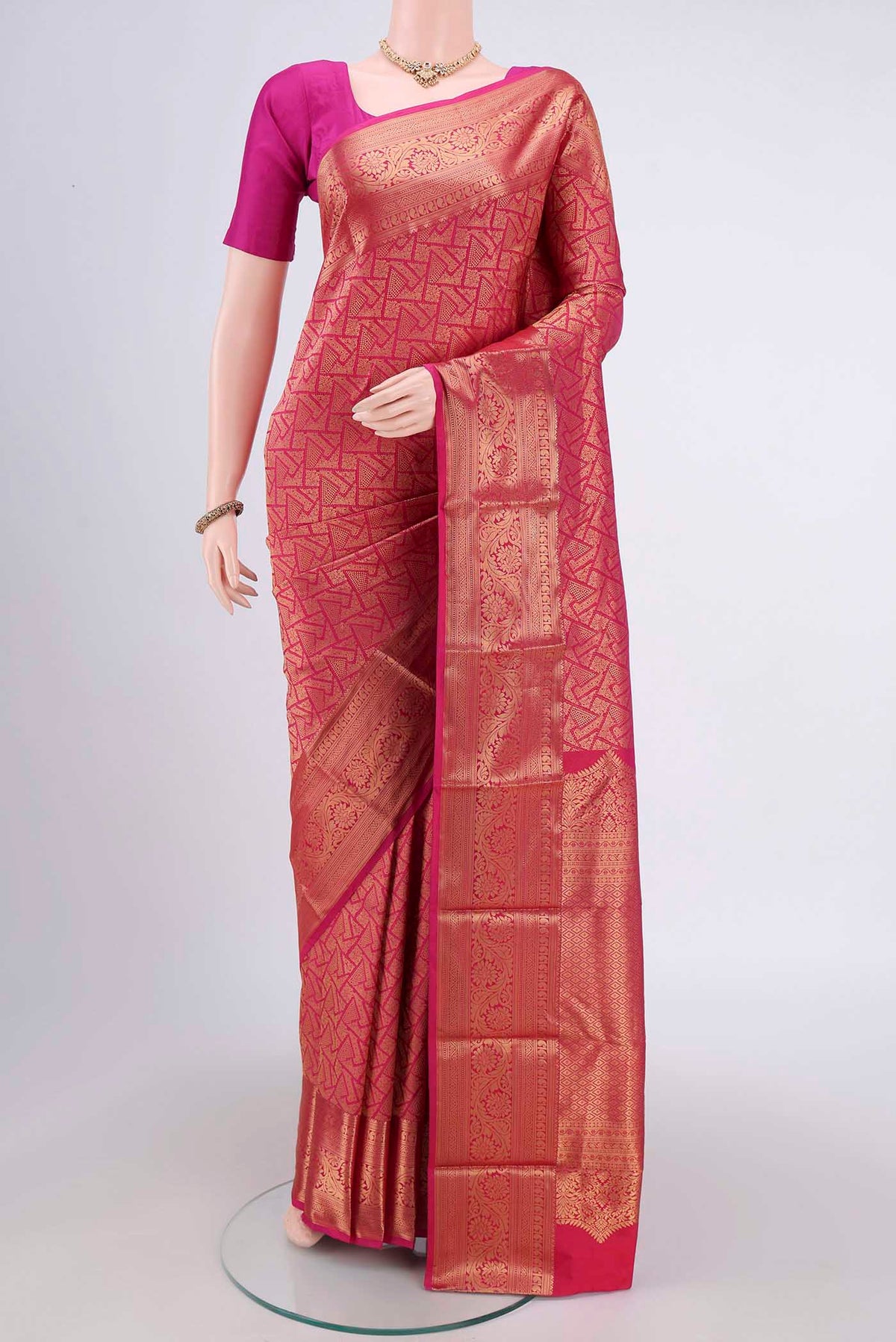 Rani Pink Dual Tone Bangalore Silk Saree with Zari Brocade on the body and Zari Border.  displayed on a mannequin