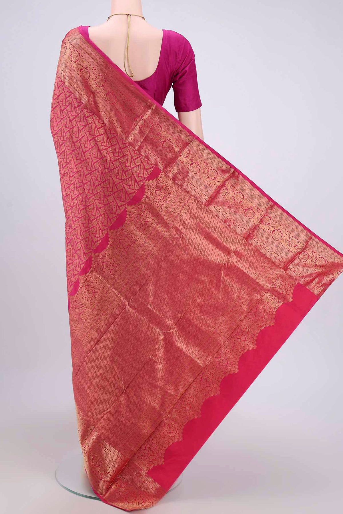 Flat view of Rani Pink Dual Tone Bangalore Silk Saree with Zari Brocade on the body and Zari Border. 