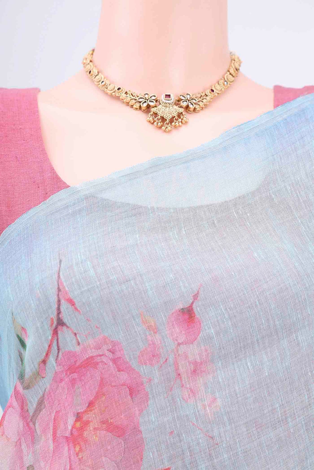 Border image of Mint Green Linen Cotton Saree with Floral Print on the body and Zari Border. 