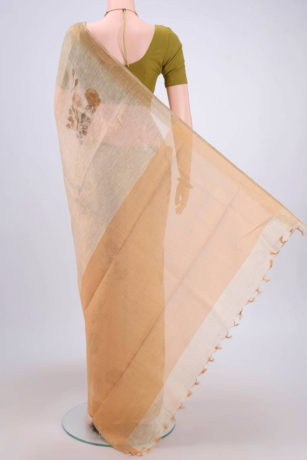 Flat view of Mustard Linen Cotton Saree with Floral Print on the body and Zari Border. 
