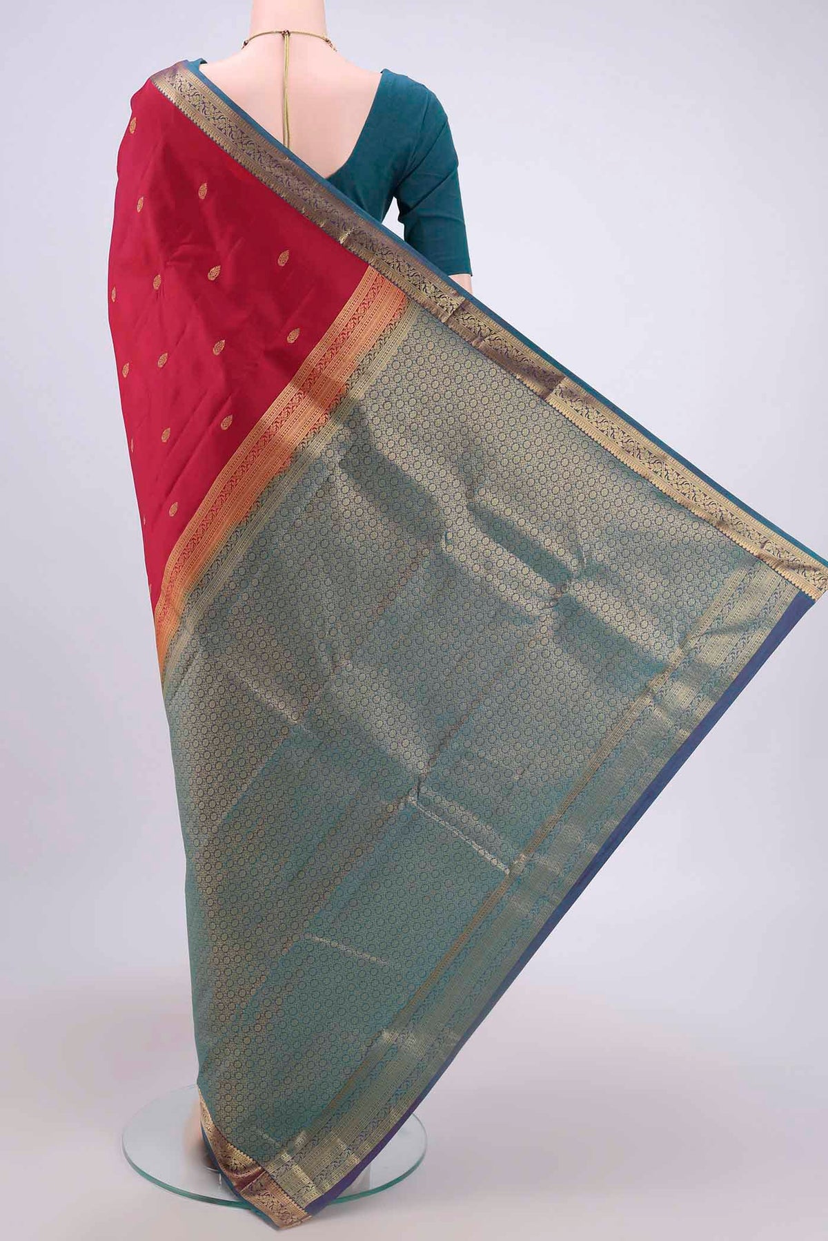 Flat view of Dark Pink Nangavalli Silk [ Salem ] Saree with Zari Butta on the body and Zari Border. 