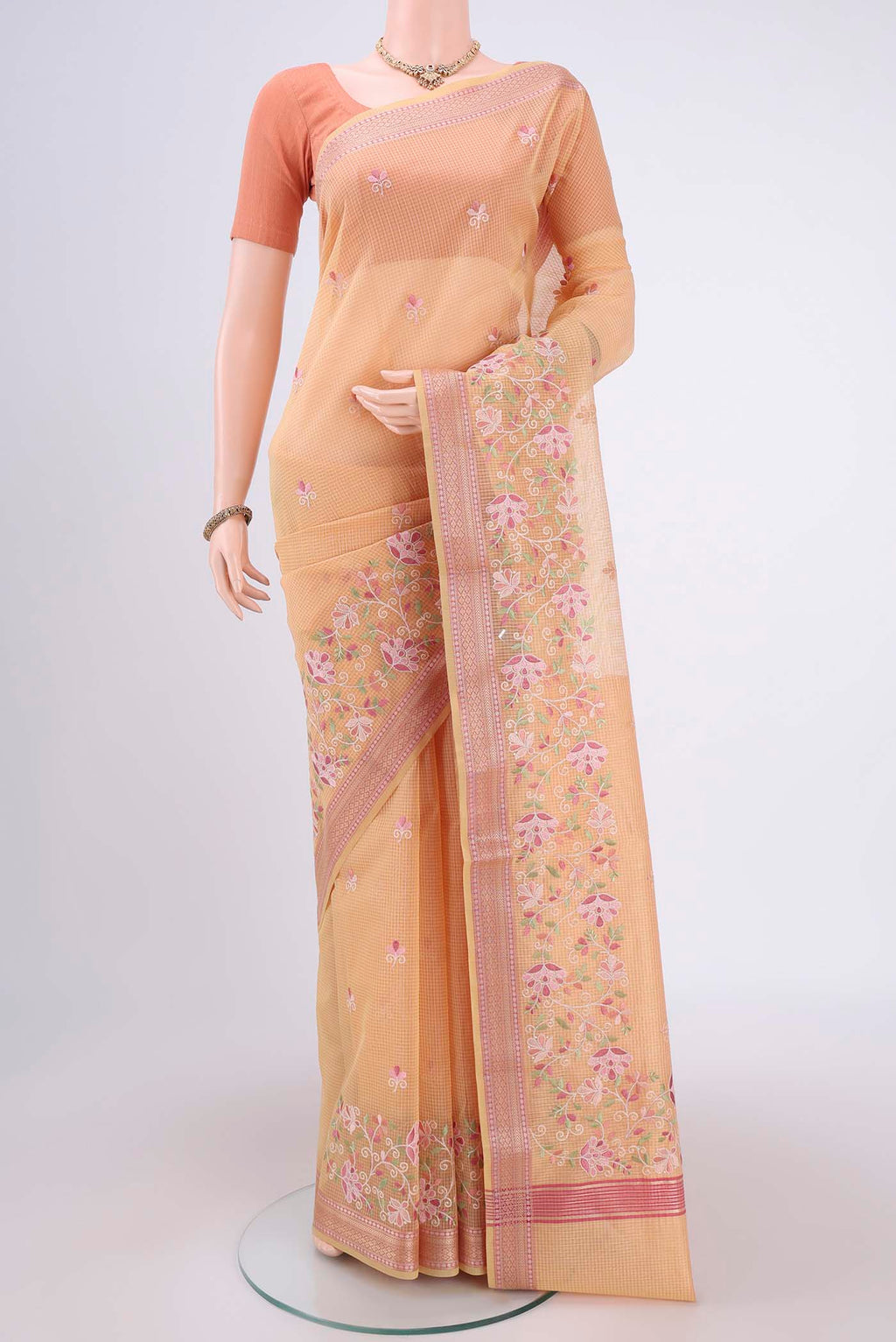 Pink Blended Kota Cotton Saree with Embroidery on the body and Embroidery Border.  displayed on a mannequin