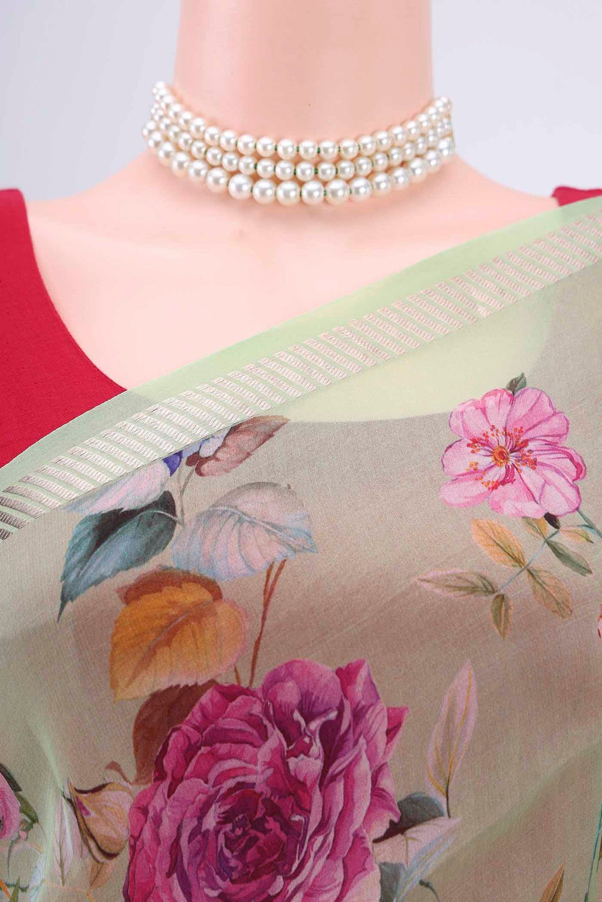 Border image of Light Green Organza Silk Saree with Floral Print on the body and Zari Border. 