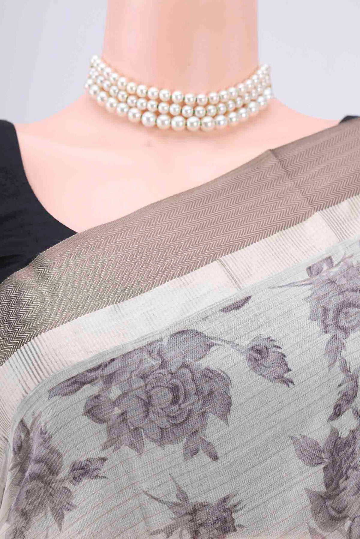 Border image of Beige Tussar Saree with Floral Print on the body and Thread Border. 