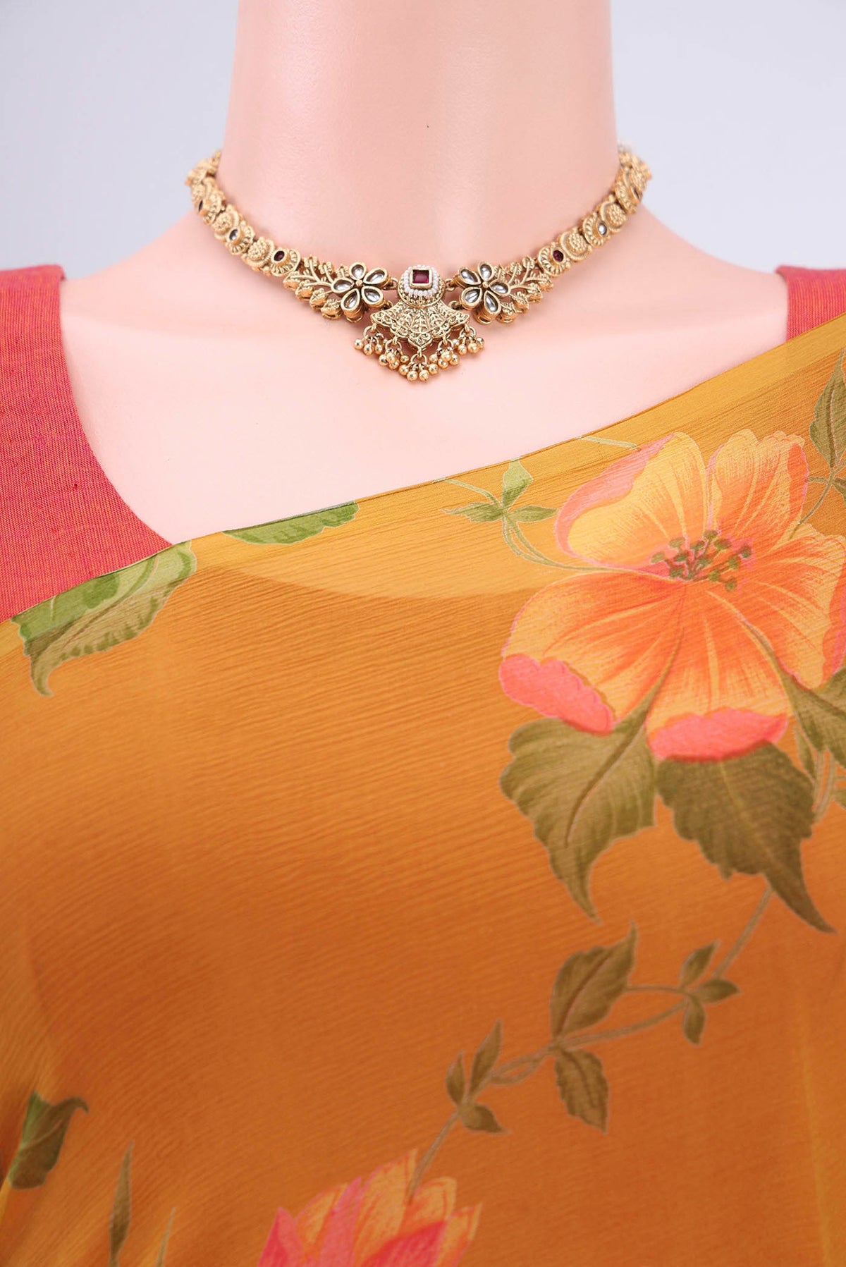 Border image of Mustard Mysore Crepe Saree with Floral Print on the body and Zari Border. 