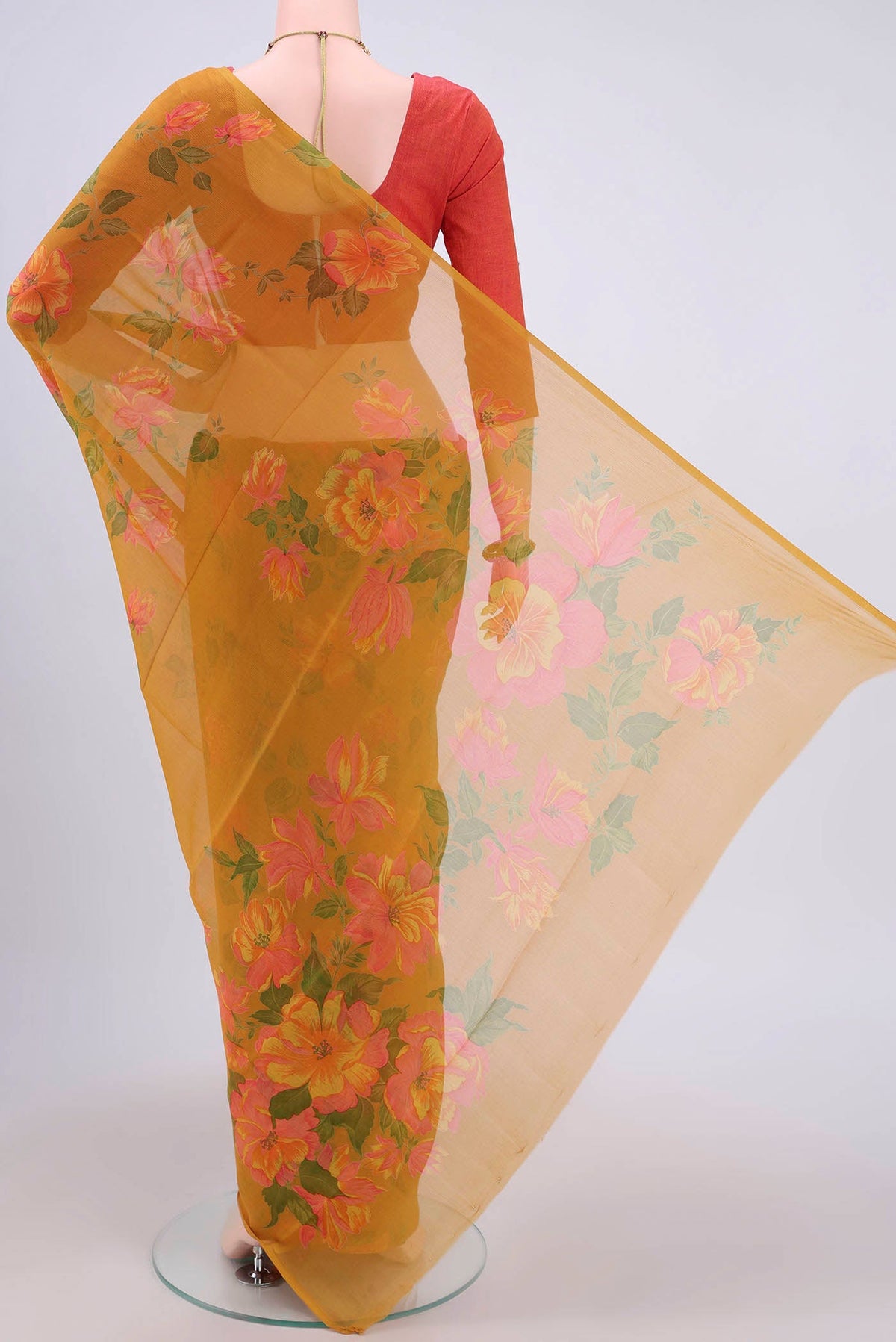 Flat view of Mustard Mysore Crepe Saree with Floral Print on the body and Zari Border. 