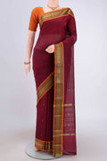 Turquoise Kanchi Cotton Saree with Zari Butta on the body and Zari Border.  displayed on a mannequin