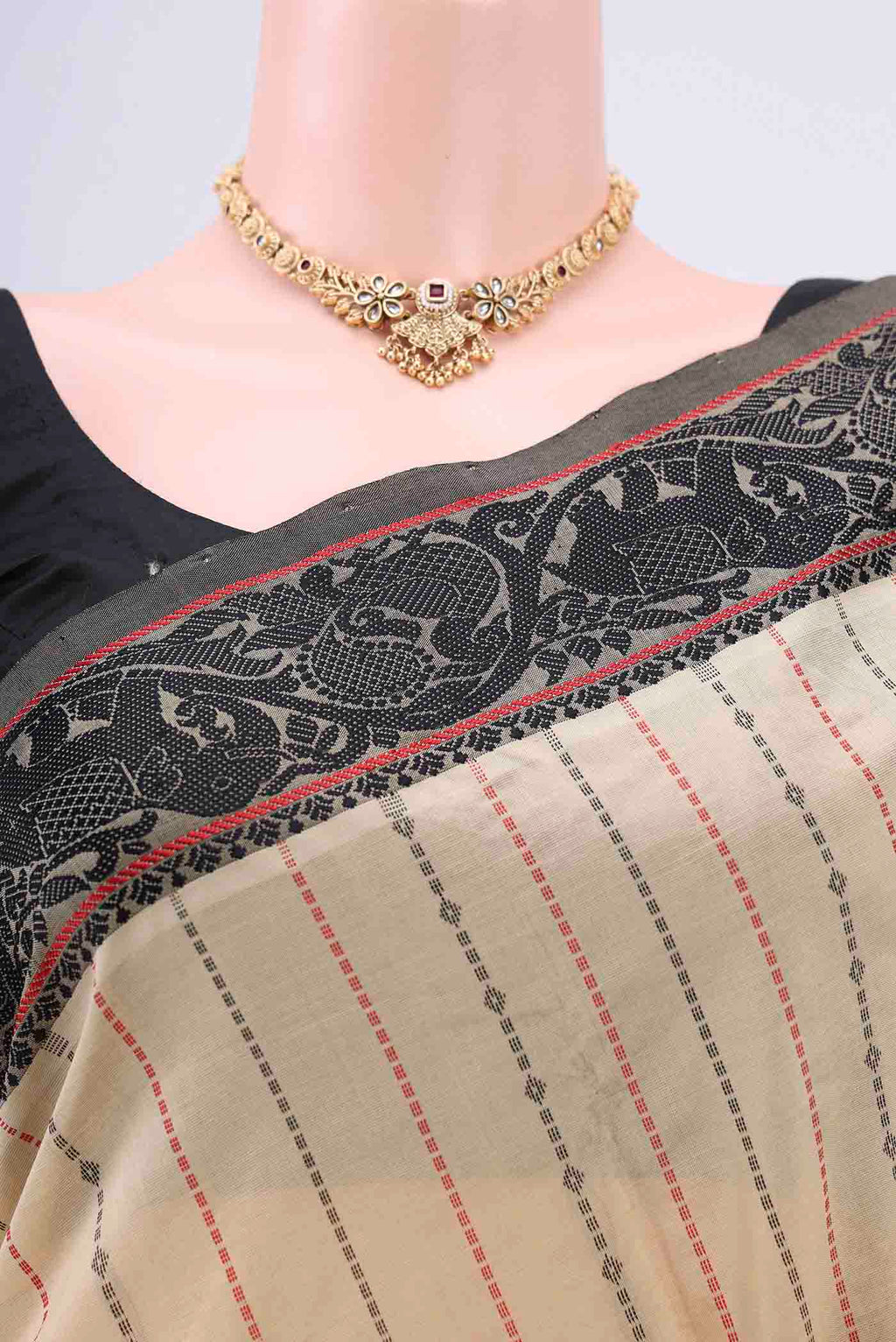 Border image of Beige Blended Silk Cotton Saree with Stripes on the body and Thread Border. 