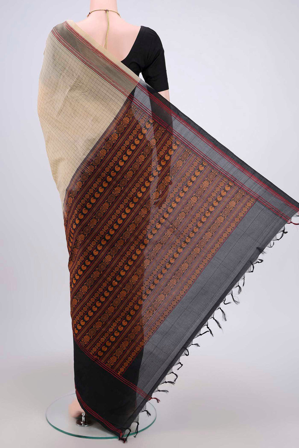 Flat view of Beige Blended Silk Cotton Saree with Checked design on the body and Thread Border. 